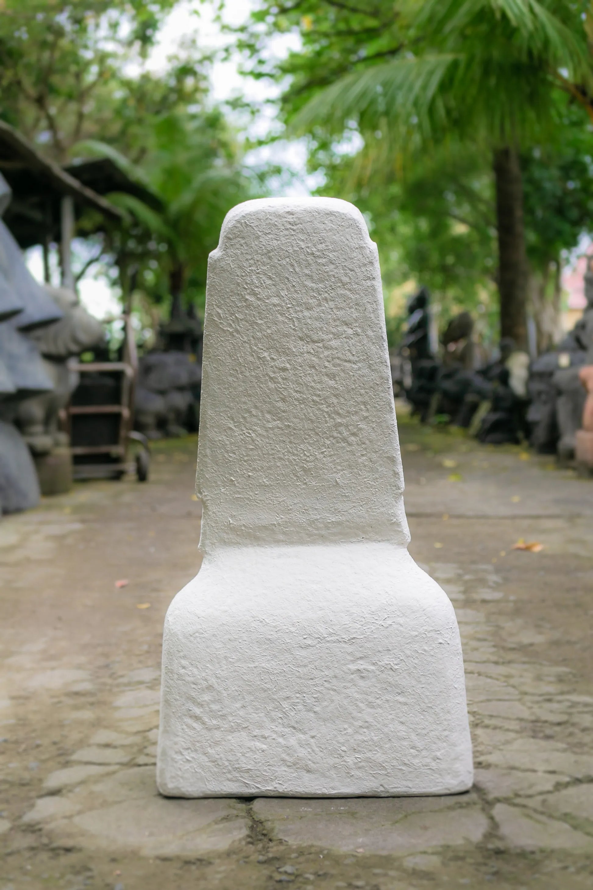 Shopping for the Moai Easter Island Head statue? Buy the best quality in white concrete and fiber, measuring 2 ft 3 in L x 1 ft 8 in W x 5 ft H—perfect for outdoors.