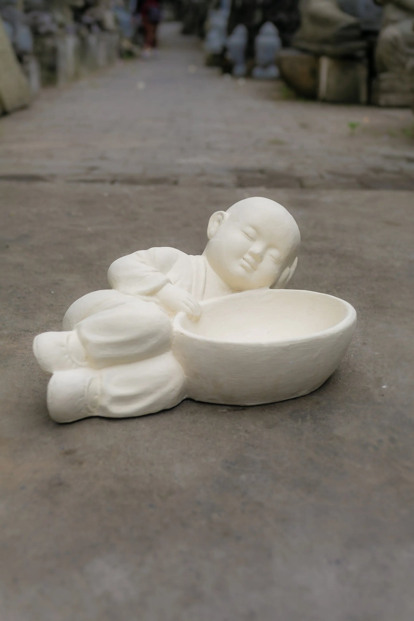 Sleeping Monk with Offering Bowl