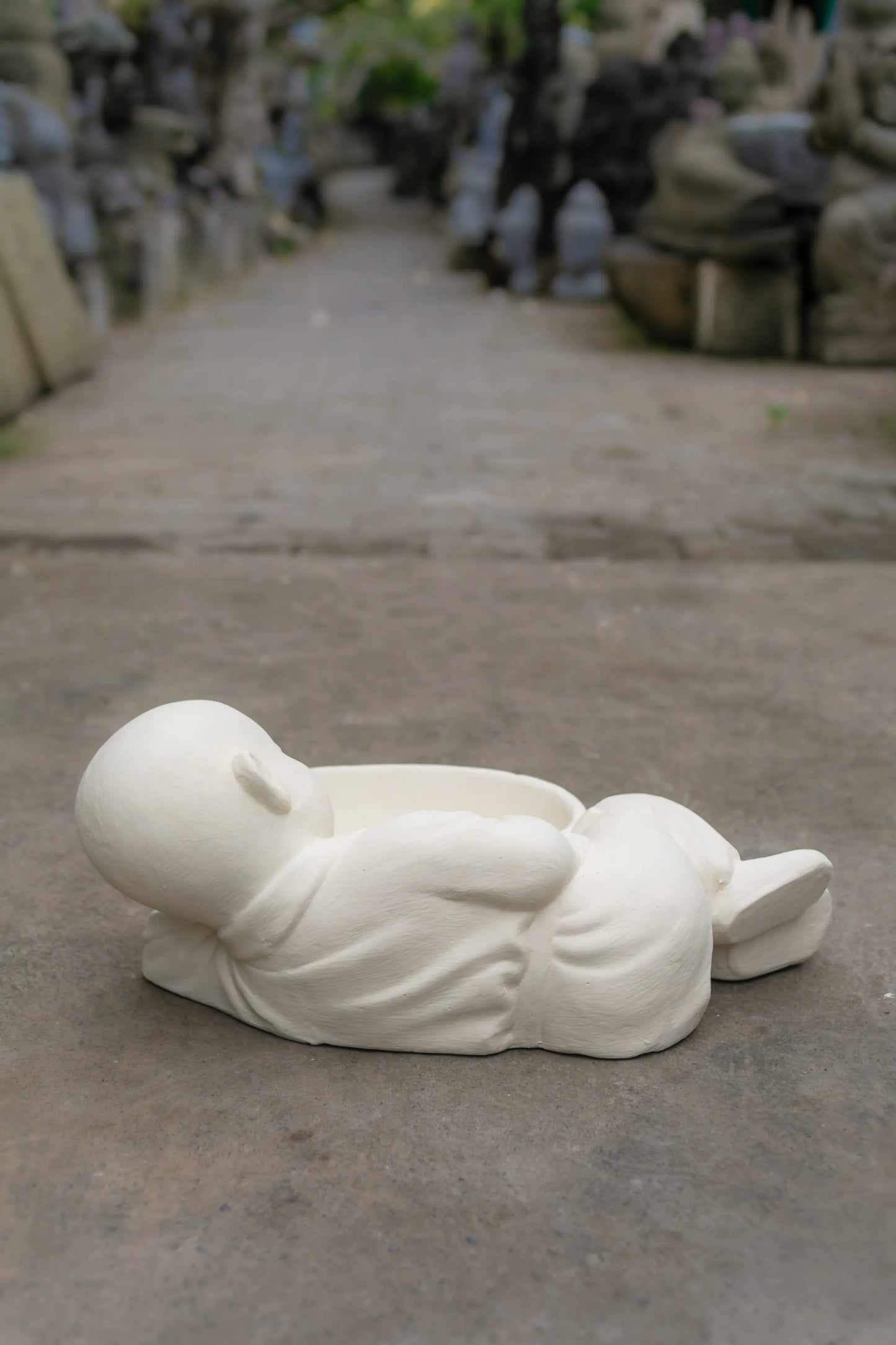 Sleeping Monk with Offering Bowl