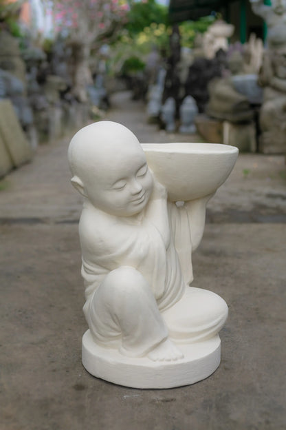 Young Monk with offering bowl