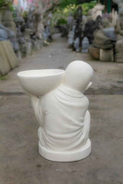 Young Monk with offering bowl