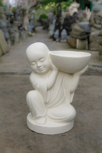 Young Monk with offering bowl