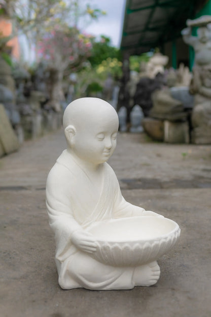 Young Monk with receiving Bowl